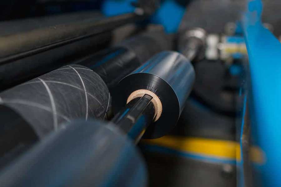 What are the factors that affect the tension of the slitting machine